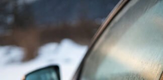 Winter Care Tips for People with Arthritis Frozen hand struggles with icy car door