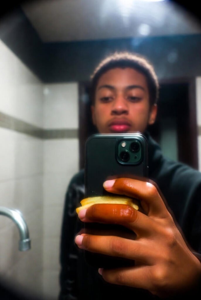 Puffy hand, blurry face: "Why do I do this"