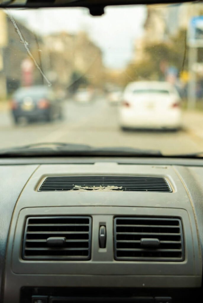 Gray film on dashboard air vents
